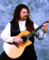 PRESS PHOTO - Bill on Stool with Ovation 